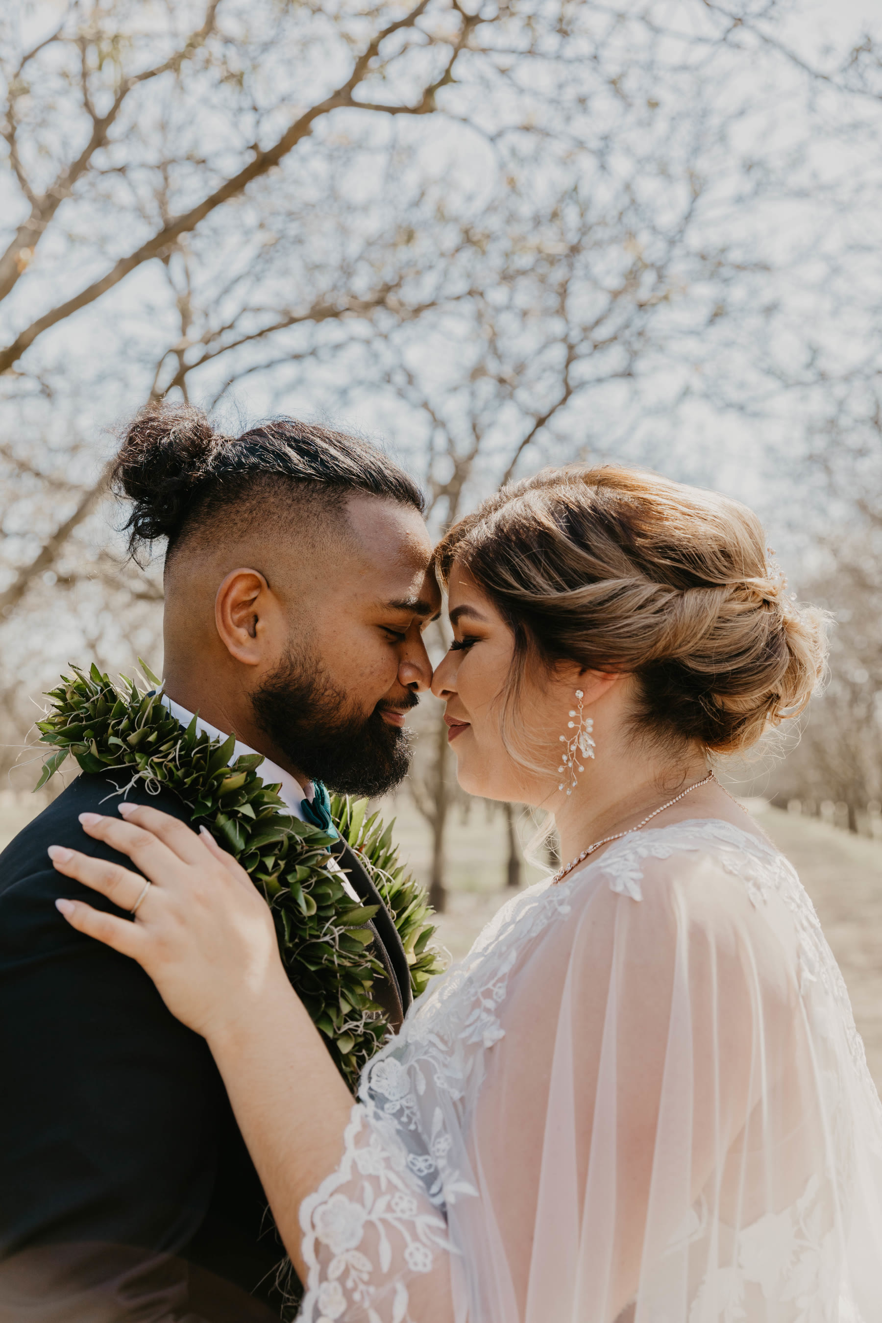 Bride and groom in profile, foreheads close, moments before a kiss — Dejeu Crew wedding photography